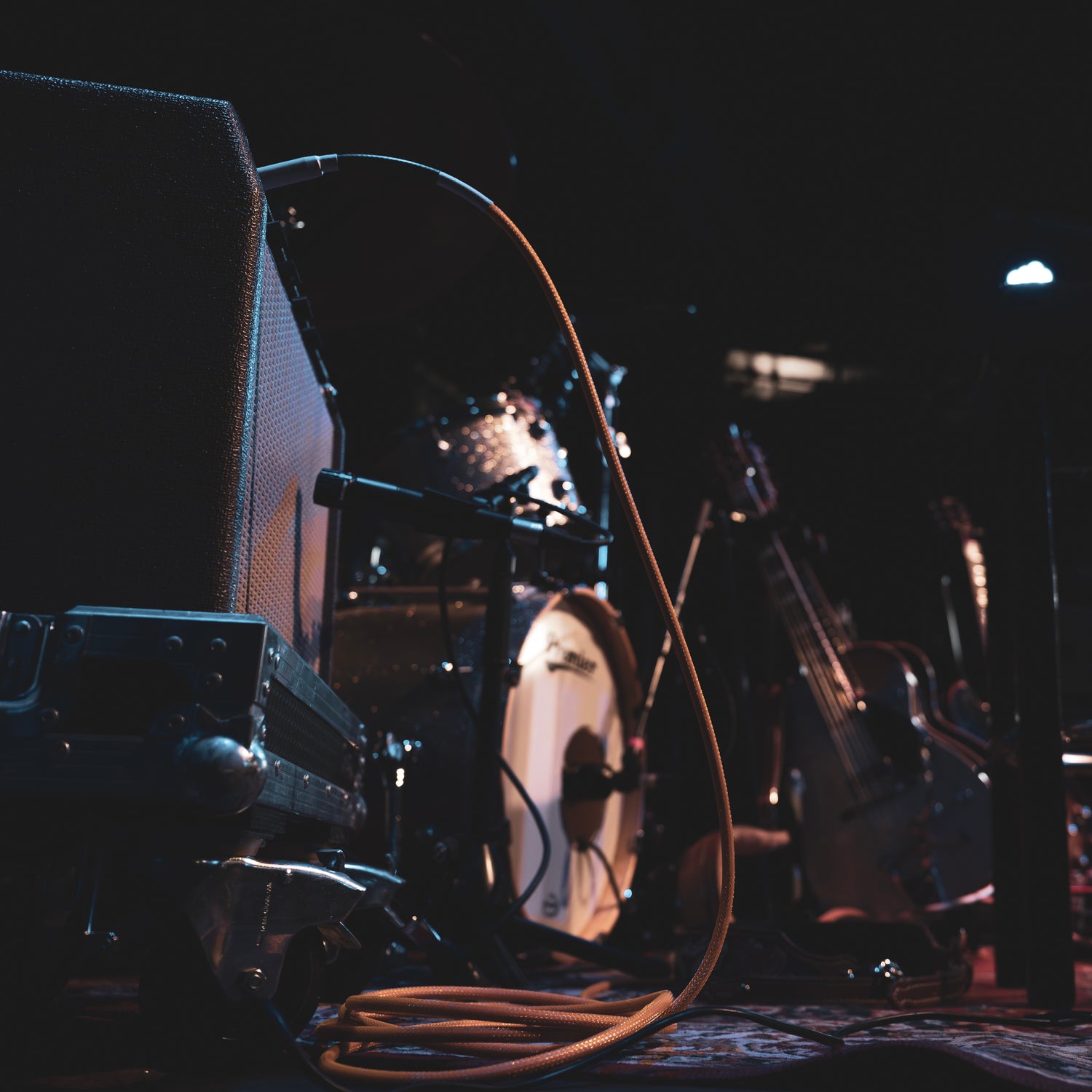 American singer-songwriter Jarrod Dickenson playing guitar on stage at The Cluny