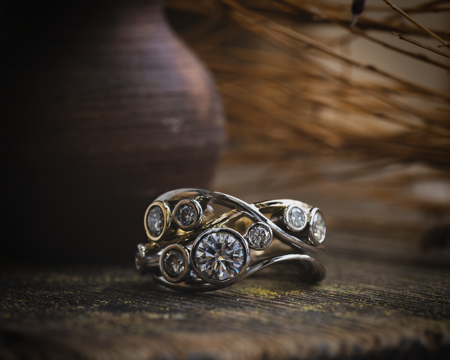 Contemporary Diamond Dress Ring photographed with a brown clay pot in the background and dried branches