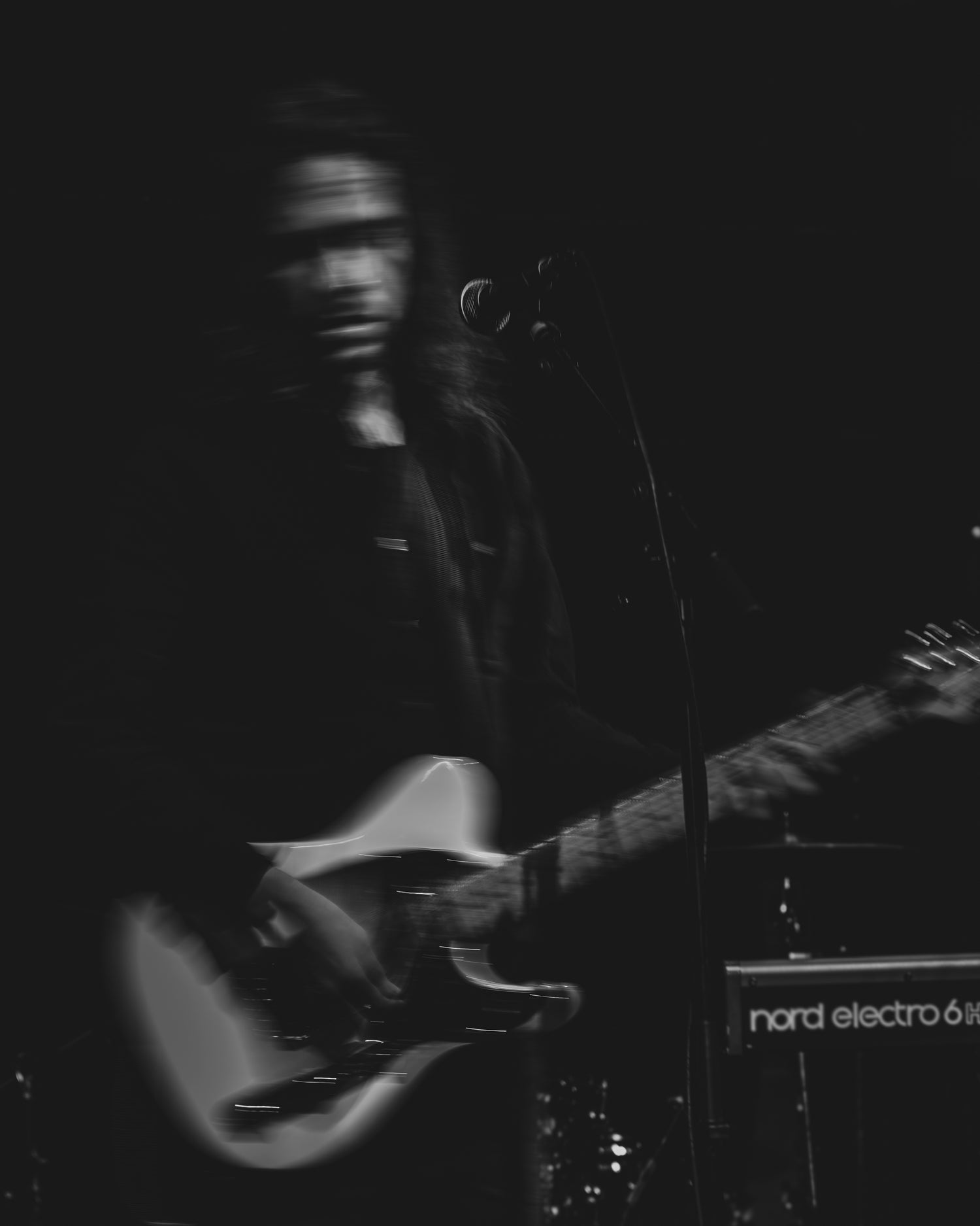 Rufus Miller playing at The Cluny in Newcastle motion blur in black and white