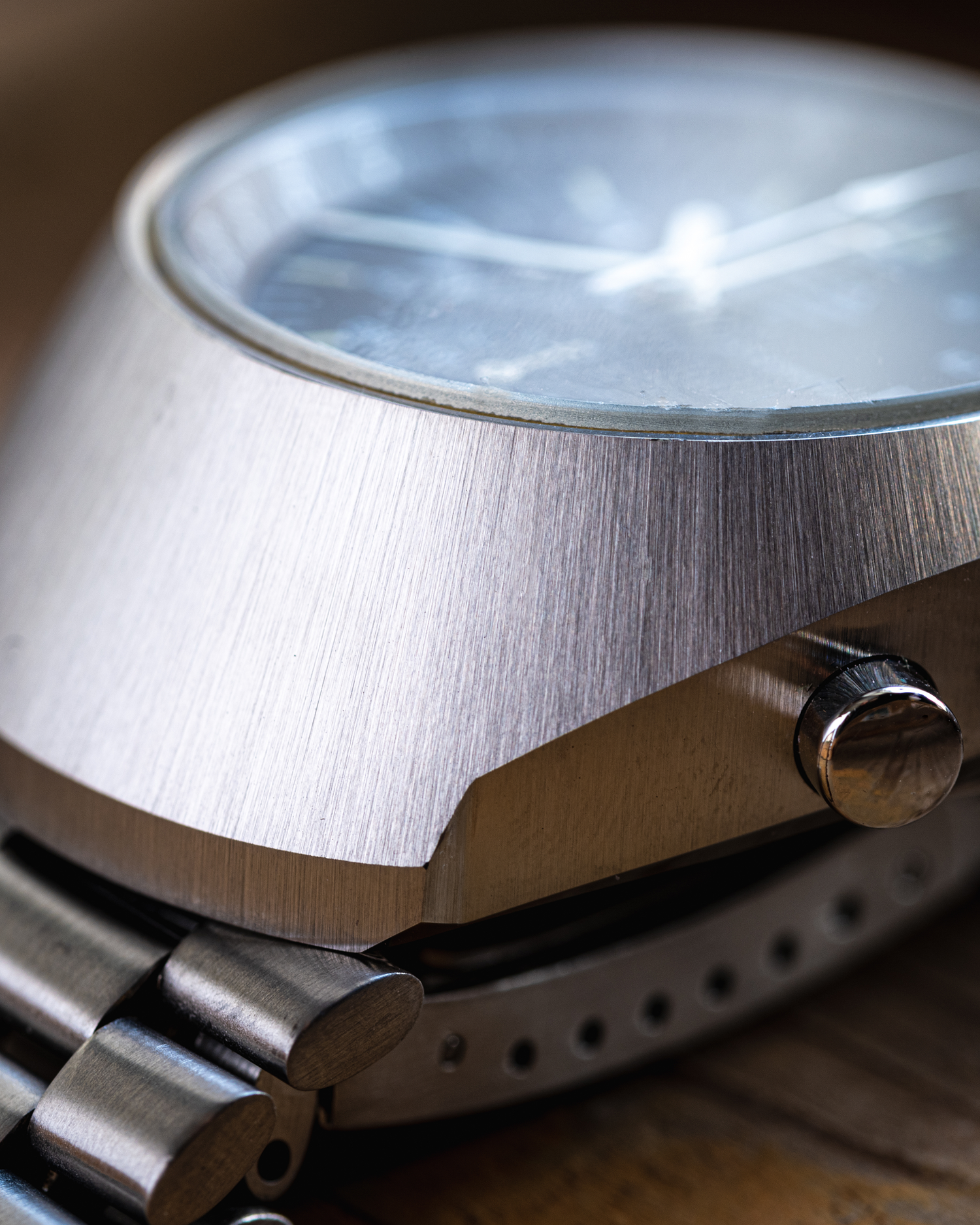 A close up of the finish of an Omega Speedmaster case