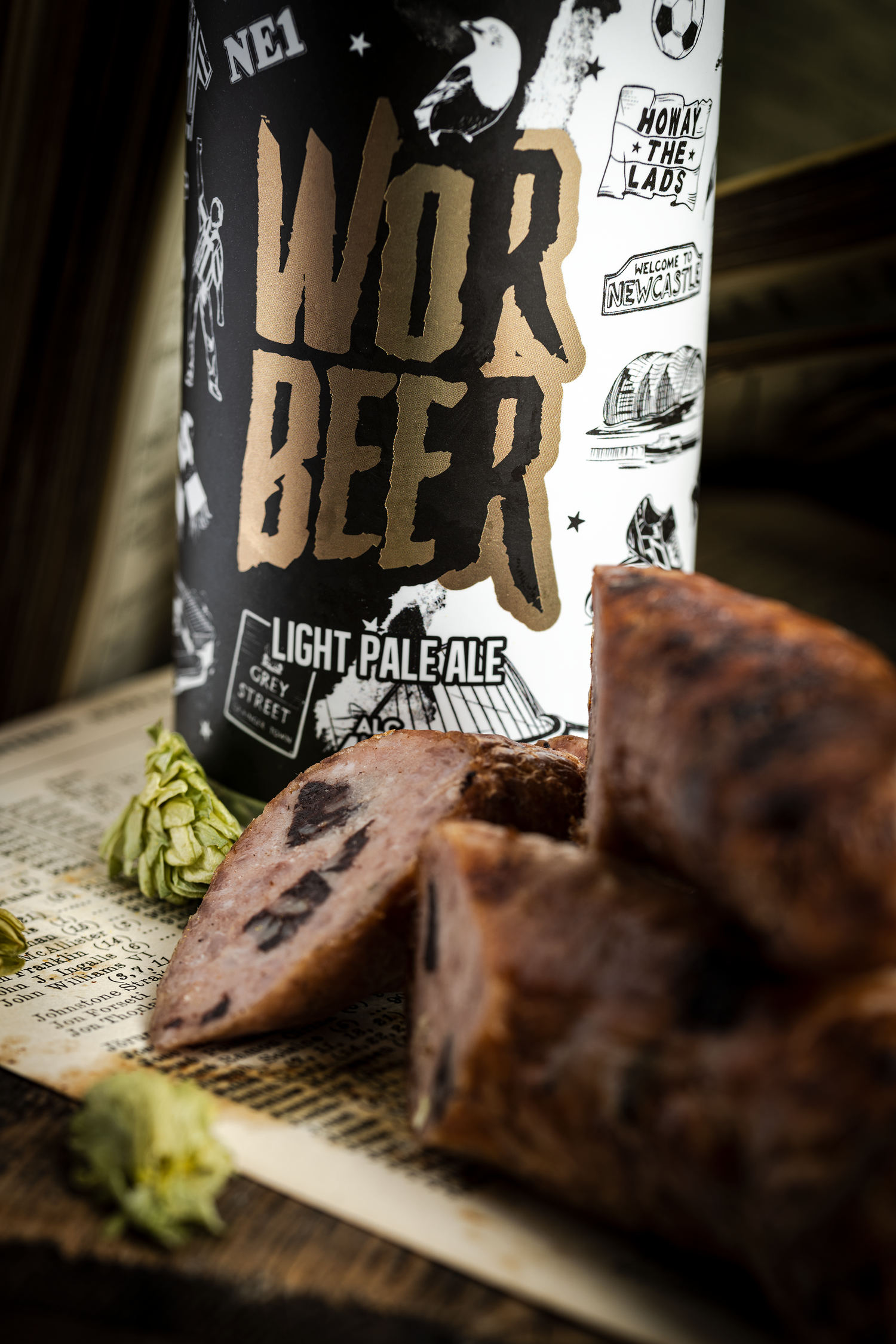 wor beer light pale ale beer with a sausage 